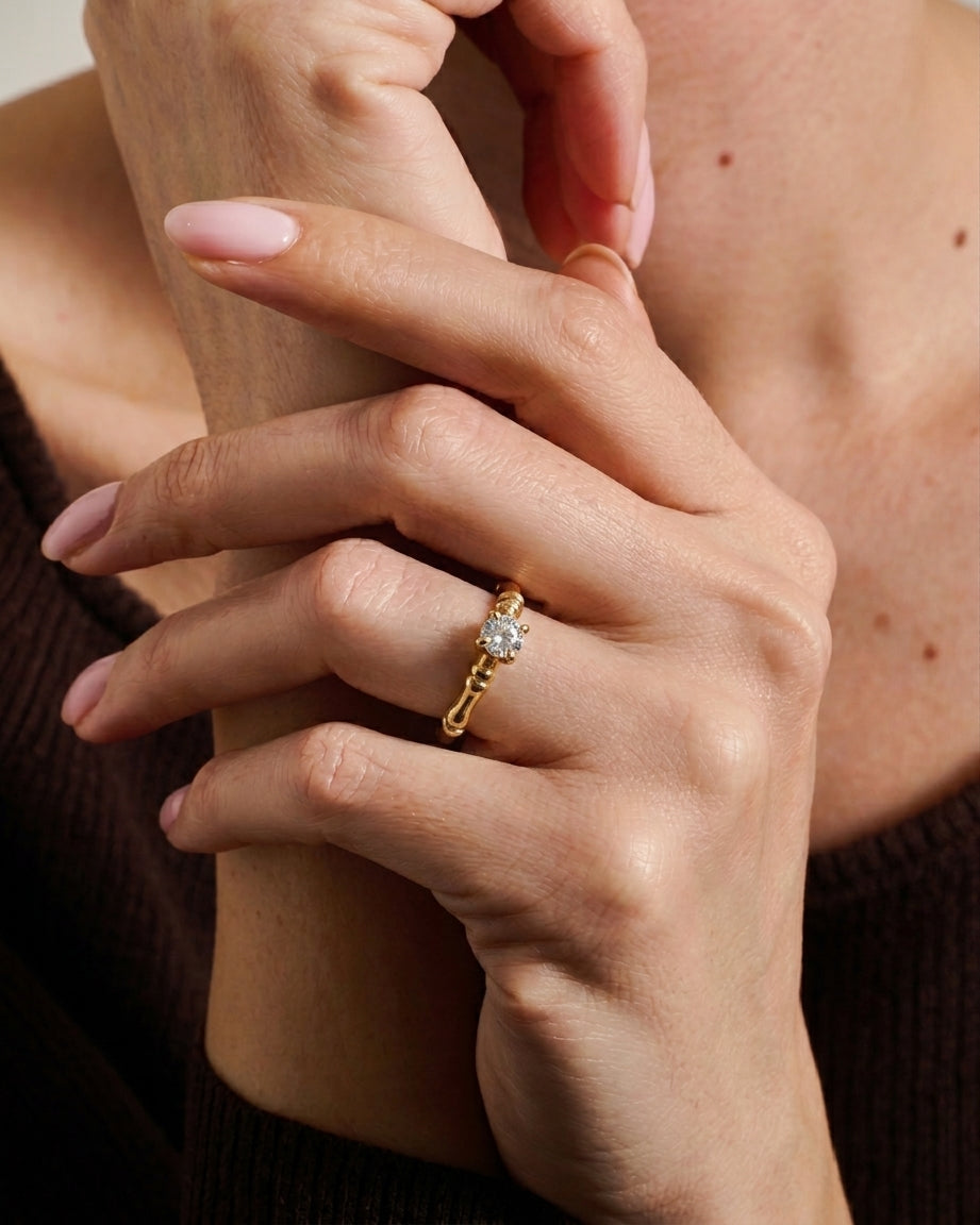 Golden whisper ring